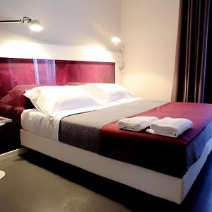 Kamer met een Queen Size Bed